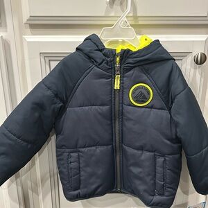 Carter’s navy jacket with lining in size 2T. Brand new with tags